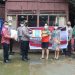 Polres Minut Salurkan Bansos dari Setpres RI kepada Warga Terdampak Covid-19 di Desa Wineti