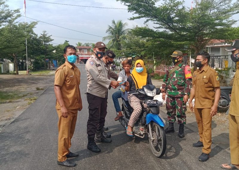 Polisi Gelar Ops Yustisi di Kecamatan Tanjung Beringin, Imbau Masyarakat Patuhi Prokes