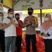 Kapolsek Bukit Batu Dampingi Penyerahan Bansos Bagi Korban Banjir dari Komunitas KBI